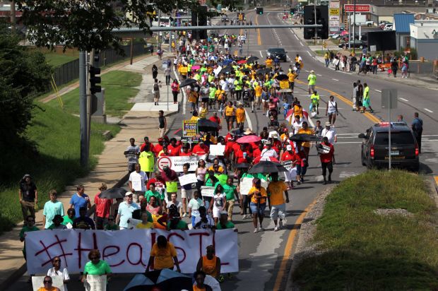 March marks two weeks since death of Michael Brown